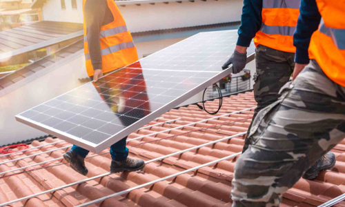 Home with rooftop solar panels (sample image)